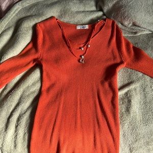 An orange vintage *comes with jules* long sleeve shirt
